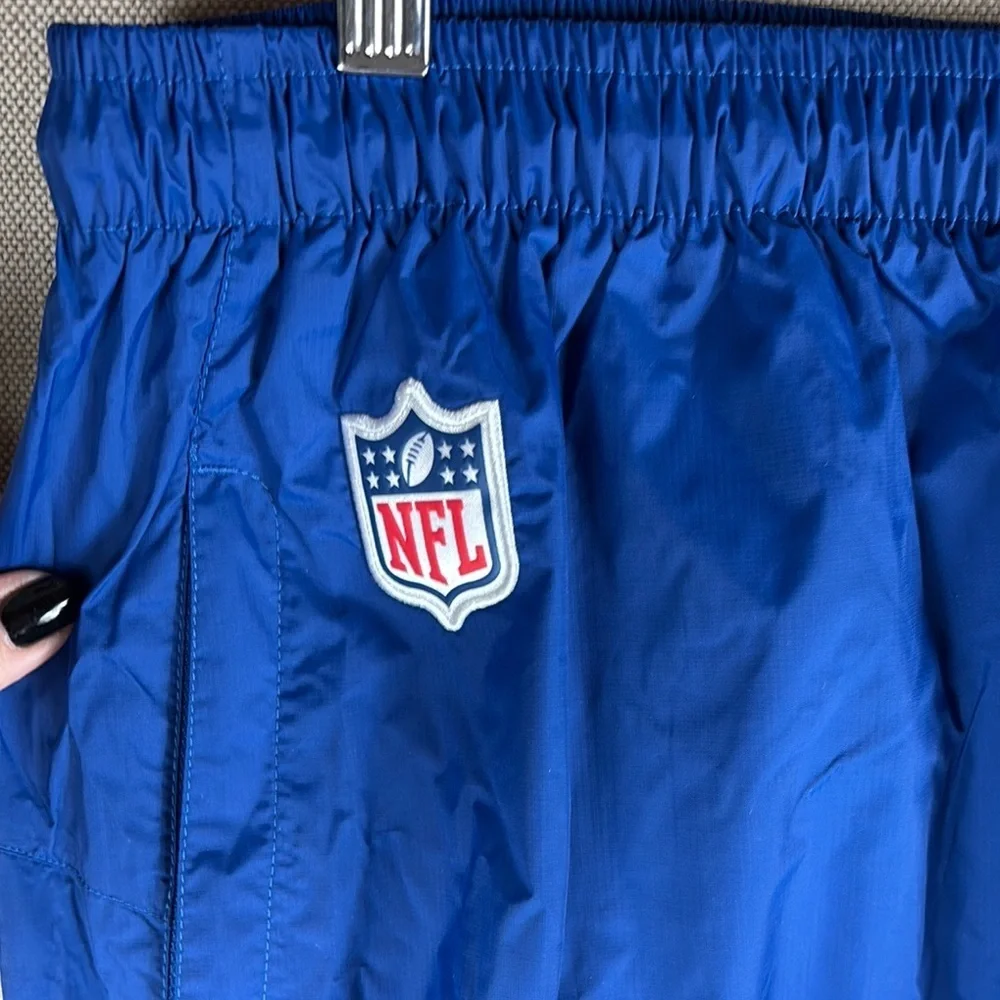 Nike > Men’s Blue NFL Onfield Apparel Storm Fit Track Pants Extra Large